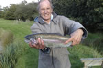 Fishing on the pond at Maddox Down Farm